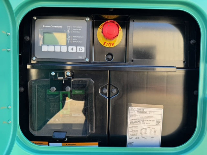 Load image into Gallery viewer, Cummins C50D6 diesel commercial generator with view of the PowerCommand 1.1 control panel and E-Stop