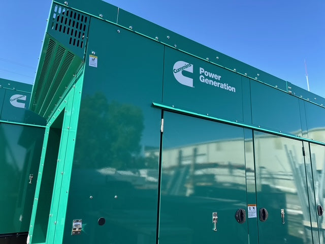 Load image into Gallery viewer, Cummins DQDAA 250kW diesel generator exterior view with green weather enclosure and 24-hour subbase fuel tank.