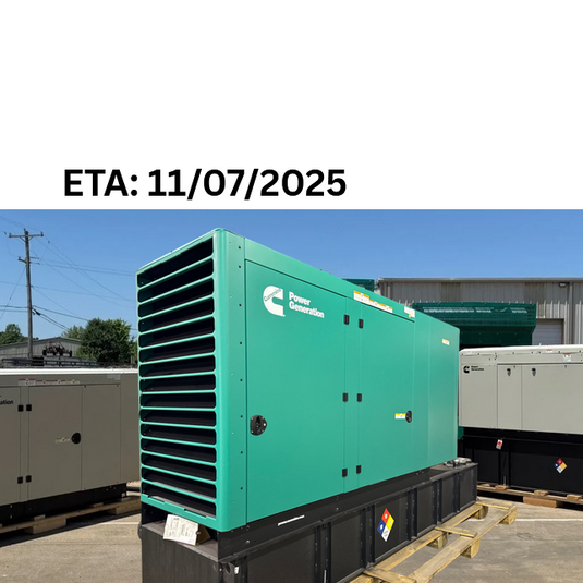 Green generator with 'Cummins' logo on a clear day