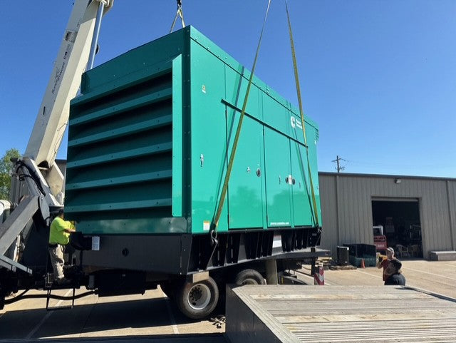 Load image into Gallery viewer, Cummins DQDAA 250kW diesel generator exterior view with green weather enclosure and 24-hour subbase fuel tank.
