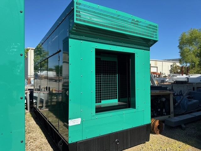 Load image into Gallery viewer, Cummins DQDAA 250kW diesel generator exterior view with green weather enclosure and 24-hour subbase fuel tank.
